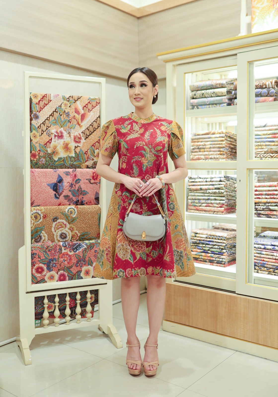 Batik Soga garment photographed inside a Javanese heritage house